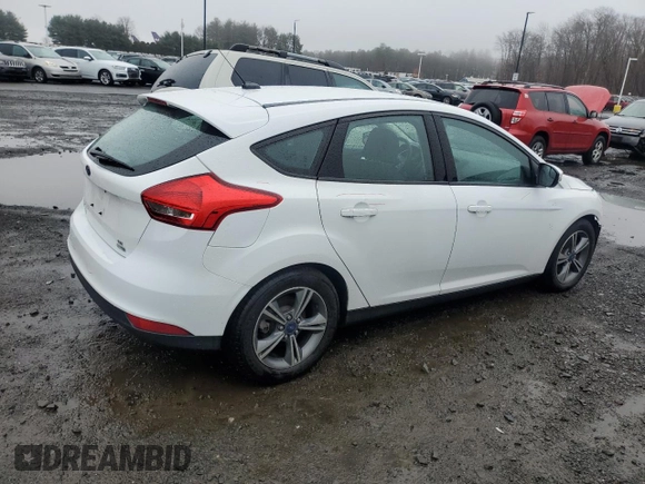 2016 Ford Focus SE with VIN 1FADP3KEXGL303972, listed as a Copart auction lot 49106385 with 33,919 mi miles and Salvage Title. Bid and sale history available at carsss.com. Image 3.