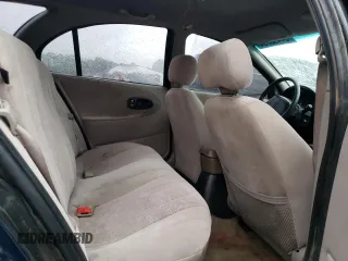 1999 Saturn SW z VIN 1G8ZK8273XZ244364, wystawiony jako Copart lot #84493794 z przebiegiem 172 284 mil mil oraz Szkody całkowita. Historia ofert i sprzedaży dostępna na DreamBid. Obrazek 10.