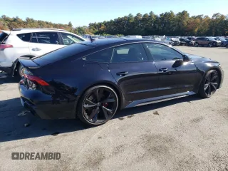 2021 Audi RS 7 z VIN WUAPCBF2XMN902368, wystawiony jako Copart lot #73284763 z przebiegiem 37 625 mil mil oraz . Historia ofert i sprzedaży dostępna na DreamBid. Obrazek 3.