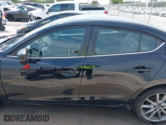 2018 Mazda 3 Touring with VIN 3MZBN1V32JM208914, listed as a IAAI auction lot 42066757 with 111,249 mi miles and . Bid and sale history available at DreamBid. Image 14.
