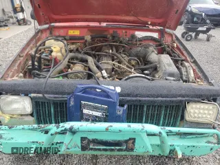 1993 Jeep Cherokee Sport with VIN 1J4FJ68S6PL506709, listed as a Copart auction lot 86638434 with 253,923 mi miles and Salvage Title. Bid and sale history available at carsss.com. Image 12.