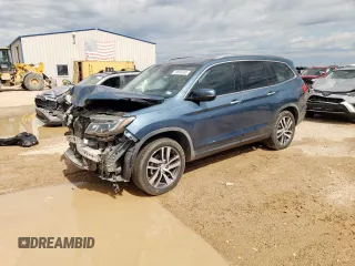 2017 Honda Pilot Touring z VIN 5FNYF6H90HB083160, wystawiony jako Copart lot #59604835 z przebiegiem 118 879 mil mil oraz Szkoda całkowita • Salvage title. Historia ofert i sprzedaży dostępna na DreamBid. Obrazek 1.