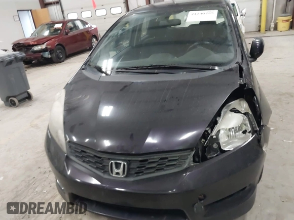 2013 Honda Fit Sport z VIN JHMGE8H56DC019556, wystawiony jako IAAI lot #41140755 z przebiegiem Nie podano mil oraz . Historia ofert i sprzedaży dostępna na DreamBid. Obrazek 11.