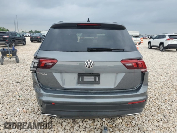 2021 Volkswagen Tiguan S z VIN 3VV1B7AX9MM012624, wystawiony jako Copart lot #55589435 z przebiegiem 61 343 mil mil oraz Szkoda całkowita • Salvage title. Historia ofert i sprzedaży dostępna na DreamBid. Obrazek 6.