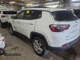 2022 Jeep Compass Latitude with VIN 3C4NJDBB3NT205928, listed as a IAAI auction lot 42832409 with 22,634 mi miles and . Bid and sale history available at DreamBid. Image 3.