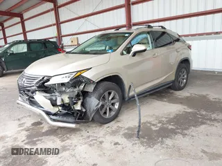 2019 Lexus RX 350 with VIN JTJBZMCA2K2039042, listed as a IAAI auction lot 42469481 with 84,794 mi miles and . Bid and sale history available at DreamBid. Image 2.