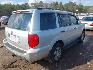 2003 Honda Pilot EX with VIN 2HKYF18693H591369, listed as a IAAI auction lot 41518617 with 325,658 mi miles. Bid and sale history available at carsss.com. Image 4.