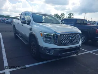 2016 Nissan Titan SV with VIN 1N6BA1F2XGN506904, listed as a IAAI auction lot 42850694 with 135,364 mi miles and . Bid and sale history available at DreamBid. Image 1.
