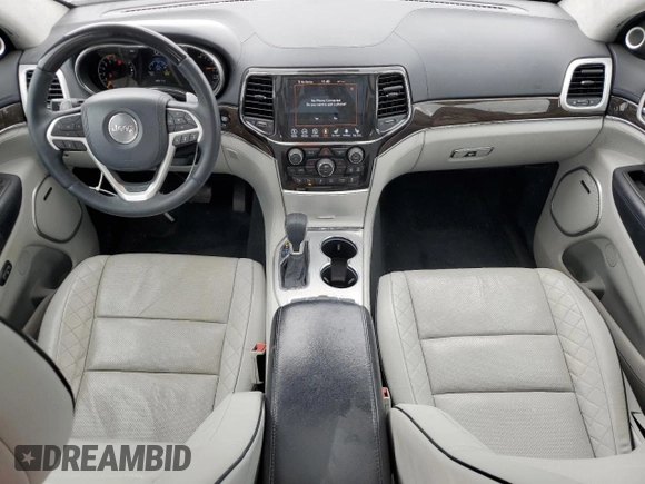 2019 Jeep Grand Cherokee Summit with VIN 1C4RJFJT4KC848996, listed as a Copart auction lot 54974925 with 106,517 mi miles and Salvage title. Bid and sale history available at DreamBid. Image 8.