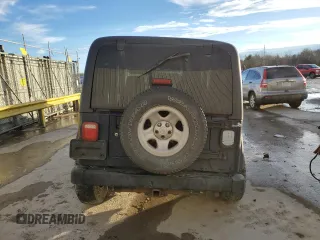 2006 Jeep Wrangler Sport Right Hand Drive with VIN 1J4F449S16P741407, listed as a Copart auction lot 88804015 with 182,059 mi miles and Salvage Title. Bid and sale history available at carsss.com. Image 6.