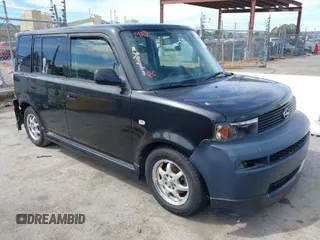 2004 Scion xB with VIN JTLKT324640138587, listed as a IAAI auction lot 42030242 with 199,289 mi miles. Bid and sale history available at carsss.com. Image 1.