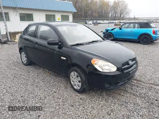 2011 Hyundai Accent GS z VIN KMHCM3AC8BU200465, wystawiony jako IAAI lot #41797288 z przebiegiem 107 831 mil mil oraz . Historia ofert i sprzedaży dostępna na DreamBid. Obrazek 1.