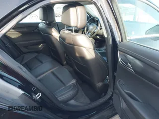 2014 Cadillac ATS Standard RWD with VIN 1G6AA5RA7E0100973, listed as a IAAI auction lot 41795657 with 93,807 mi miles and . Bid and sale history available at DreamBid. Image 8.