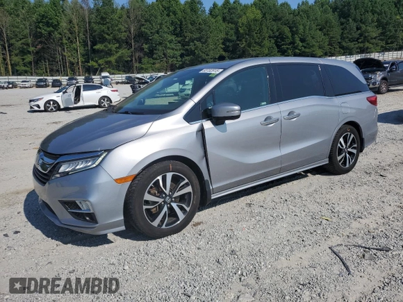 2018 Honda Odyssey Elite with VIN 5FNRL6H95JB062033, listed as a Copart auction lot 63732915 with 105,234 mi miles and Salvage title. Bid and sale history available at DreamBid. Image 1.