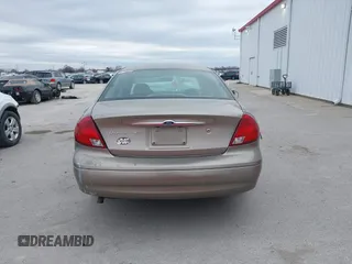 2002 Ford Taurus SES Standard with VIN 1FAFP55U52G135781, listed as a IAAI auction lot 41520037 with 196,207 mi miles. Bid and sale history available at carsss.com. Image 16.