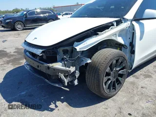 2022 Tesla Model Y Long Range with VIN 7SAYGAEE8NF431786, listed as a IAAI auction lot 41750353 with 67,846 mi miles and . Bid and sale history available at carsss.com. Image 6.