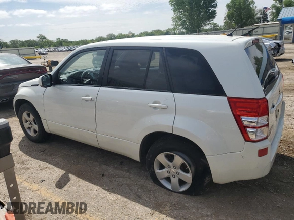 2013 Suzuki Grand Vitara Premium z VIN JS3TE0D62D4100310, wystawiony jako Copart lot #54916065 z przebiegiem 116 428 mil mil oraz Szkoda całkowita • Salvage title. Historia ofert i sprzedaży dostępna na DreamBid. Obrazek 2.