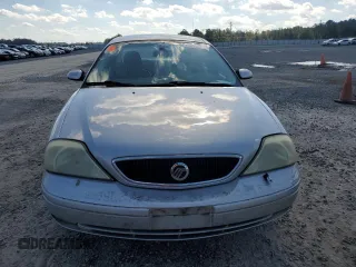 2003 Mercury Sable LS with VIN 1MEHM55S73A619013, listed as a Copart auction lot 73504154 with 200,135 mi miles and Salvage Title. Bid and sale history available at DreamBid. Image 5.