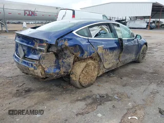 2019 Tesla Model 3 Mid Range z VIN 5YJ3E1EAXKF332974, wystawiony jako IAAI lot #41921722 z przebiegiem Nie podano mil oraz . Historia ofert i sprzedaży dostępna na DreamBid. Obrazek 4.