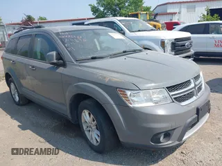 2019 Dodge Journey SE with VIN 3C4PDDBG9KT744576, listed as a IAAI auction lot 42435583 with 101,731 mi miles and . Bid and sale history available at DreamBid. Image 1.