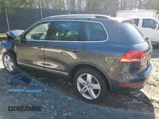 2012 Volkswagen Touareg Lux с VIN WVGEK9BP1CD008132, выставлен на аукционе Copart как лот 49501765 с пробегом 156 594 миль миль и Списание • Salvage title. История ставок и продаж доступна на DreamBid. Изображение 2.