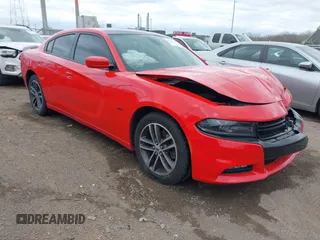 2018 Dodge Charger GT with VIN 2C3CDXJG2JH296789, listed as a IAAI auction lot 42031330 with 57,801 mi miles and . Bid and sale history available at DreamBid. Image 1.
