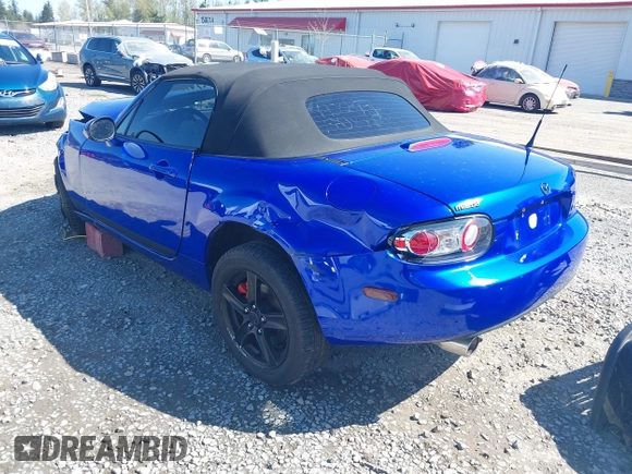 2006 Mazda MX-5 Miata Touring z VIN JM1NC25F560104482, wystawiony jako IAAI lot #42045035 z przebiegiem 131 892 mil mil oraz . Historia ofert i sprzedaży dostępna na DreamBid. Obrazek 3.