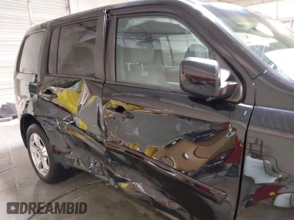 2014 Honda Pilot EX-L with VIN 5FNYF3H76EB012974, listed as a IAAI auction lot 41351669 with 110,380 mi miles and . Bid and sale history available at carsss.com. Image 6.