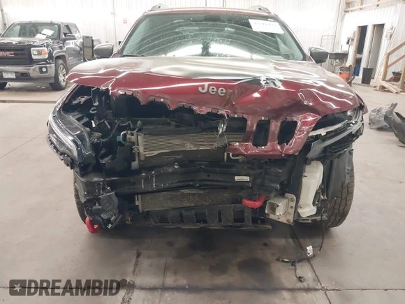 2019 Jeep Cherokee Trailhawk with VIN 1C4PJMBX7KD200267, listed as a IAAI auction lot 42216422 with Not provided miles and . Bid and sale history available at DreamBid. Image 6.