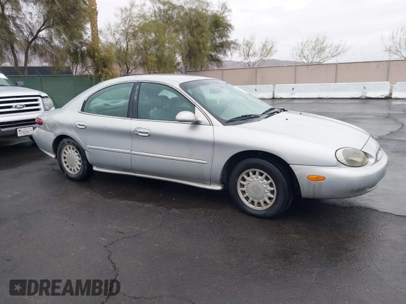 1997 Mercury Sable GS z VIN 1MELM50U8VG603194, wystawiony jako IAAI lot #41558010 z przebiegiem 265 169 mil mil oraz . Historia ofert i sprzedaży dostępna na DreamBid. Obrazek 13.