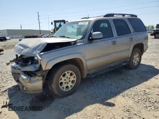 2002 Chevrolet Tahoe Z71 z VIN 1GNEK13T72R285197, wystawiony jako Copart lot #53784905 z przebiegiem 226 662 mil mil oraz Szkoda całkowita • Salvage title. Historia ofert i sprzedaży dostępna na DreamBid. Obrazek 1.