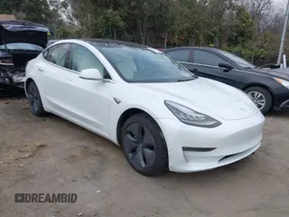 2018 Tesla Model 3 Long Range Battery with VIN 5YJ3E1EB4JF086012, listed as a IAAI auction lot 41683859 with 52,059 mi miles and . Bid and sale history available at DreamBid. Image 1.