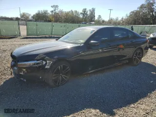2022 BMW 7 Series 750i xDrive with VIN WBA7U2C05NCH77127, listed as a Copart auction lot 83849074 with 35079 miles and Salvage Title. Bid and sale history available at carsss.com. Image 1.