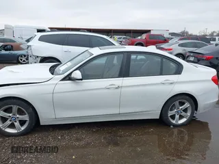 2014 BMW 3 Series 328i xDrive with VIN WBA3B5G50ENS06304, listed as a IAAI auction lot 41402704 with 139,943 mi miles. Bid and sale history available at carsss.com. Image 14.