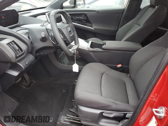 2024 Subaru Solterra Premium с VIN JTMABABAXRA061504, выставлен на аукционе Copart как лот 85550114 с пробегом 9 602 миль миль и Списание • Salvage title. История ставок и продаж доступна на DreamBid. Изображение 7.