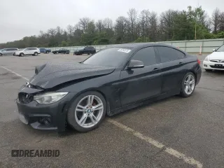 2015 BMW 4 Series 428i xDrive with VIN WBA4C9C54FG135161, listed as a Copart auction lot 59754515 with 140,518 mi miles and Salvage title. Bid and sale history available at DreamBid. Image 1.