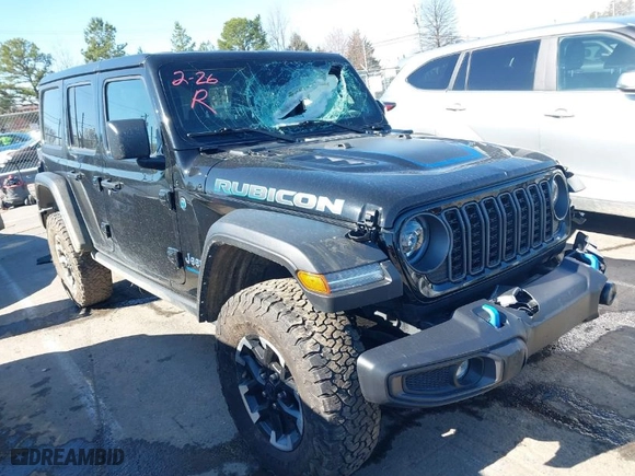2024 Jeep Wrangler 4xe Rubicon with VIN 1C4RJXR65RW241101, listed as a IAAI auction lot 41778044 with 32,041 mi miles. Bid and sale history available at carsss.com. Image 1.