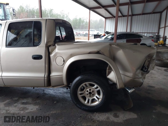 2003 Dodge Dakota SLT with VIN 1D7HL48N93S303911, listed as a IAAI auction lot 41536555 with 383,306 mi miles. Bid and sale history available at carsss.com. Image 18.
