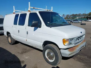 2000 Ford Econoline Cargo with VIN 1FTNE2422YHA04997, listed as a IAAI auction lot 41641159 with 132,454 mi miles. Bid and sale history available at carsss.com. Image 1.