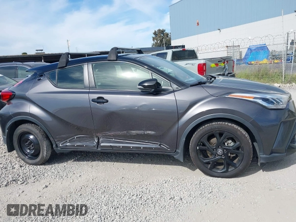 2021 Toyota C-HR LE with VIN JTNKHMBX1M1120212, listed as a IAAI auction lot 41975849 with 62,228 mi miles. Bid and sale history available at carsss.com. Image 14.