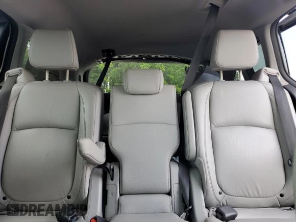 2021 Honda Odyssey Touring z VIN 5FNRL6H85MB039444, wystawiony jako Copart lot #57142205 z przebiegiem 74 228 mil mil oraz Szkoda całkowita • Salvage title. Historia ofert i sprzedaży dostępna na DreamBid. Obrazek 10.