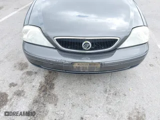 2002 Mercury Sable GS with VIN 1MEFM50U02G614697, listed as a IAAI auction lot 42087379 with 90,209 mi miles. Bid and sale history available at carsss.com. Image 6.