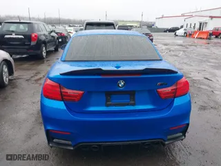 2015 BMW M4 with VIN WBS3U9C5XFJ968082, listed as a IAAI auction lot 41513593 with 57,715 mi miles. Bid and sale history available at carsss.com. Image 16.