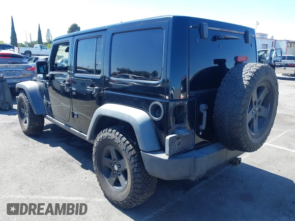 2008 Jeep Wrangler Unlimited Rubicon with VIN 1J8GA69108L574773, listed as a IAAI auction lot 42714300 with 106,974 mi miles and . Bid and sale history available at DreamBid. Image 3.