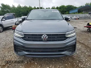2024 Volkswagen Tiguan SE R-Line Black z VIN 3VVCB7AX0RM109453, wystawiony jako Copart lot #55973745 z przebiegiem 9 620 mil mil oraz Czysty tytuł • Clean title. Historia ofert i sprzedaży dostępna na DreamBid. Obrazek 5.