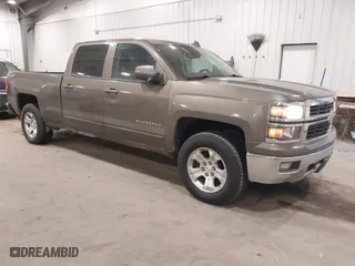 2015 Chevrolet Silverado 1500 LT with VIN 3GCUKREC5FG207488, listed as a IAAI auction lot 41472511 with 167,448 mi miles. Bid and sale history available at carsss.com. Image 1.