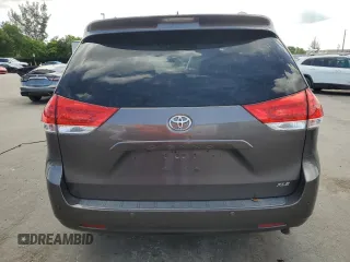 2013 Toyota Sienna XLE AAS with VIN 5TDYK3DC7DS389872, listed as a Copart auction lot 66072995 with 95,797 mi miles and Clean title. Bid and sale history available at DreamBid. Image 6.