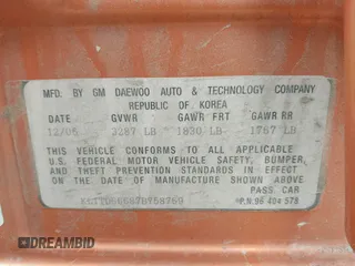 2007 Chevrolet Aveo LS z VIN KL1TD66687B758769, wystawiony jako IAAI lot #41895645 z przebiegiem 198 811 mil mil oraz . Historia ofert i sprzedaży dostępna na DreamBid. Obrazek 9.