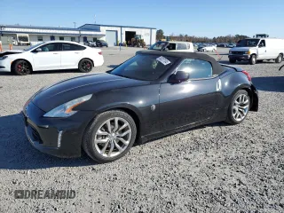 2014 Nissan 370Z Touring with VIN JN1AZ4FH3EM620195, listed as a Copart auction lot 83207104 with 66,974 mi miles and Salvage Title. Bid and sale history available at DreamBid. Image 1.