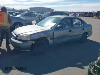2000 Honda Civic LX with VIN 2HGEJ6572YH516977, listed as a IAAI auction lot 41729899 with 1 mi miles. Bid and sale history available at carsss.com. Image 2.